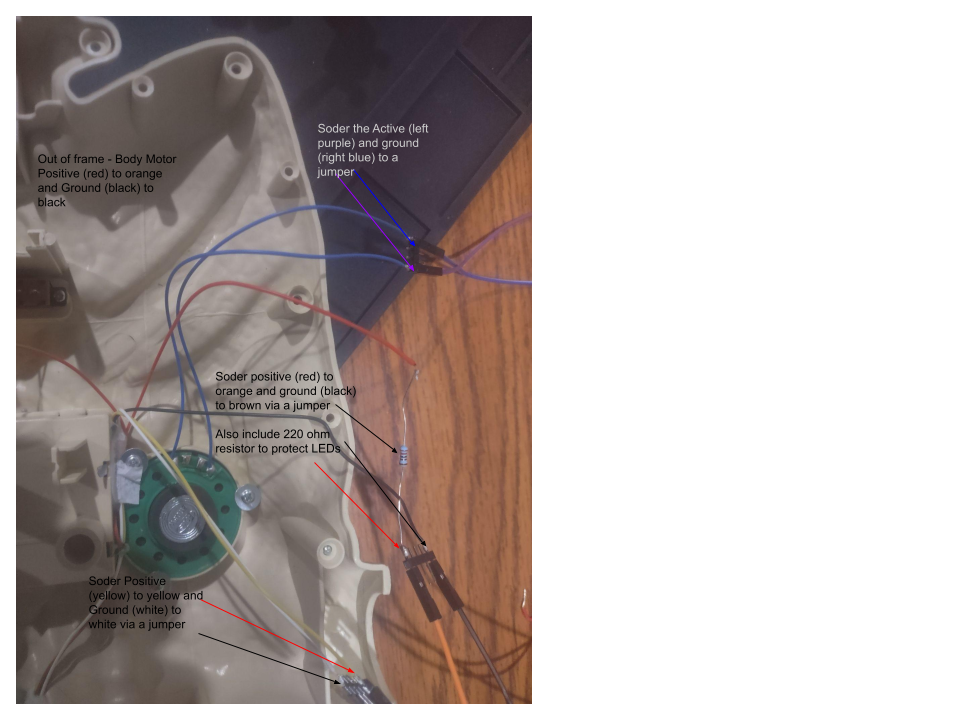Close-up photo showing the wires from the skeleton's components connected to jumper cables.